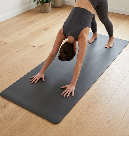 Kvyra Natural Rubber PU Yoga Mat 183 x 68 cm Charcoal with Sling - Lifestyle view